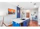 Stylish kitchen island with modern lighting, a built-in wine cooler, and chic decor for entertaining at 361 17Th Nw St # 1610, Atlanta, GA 30363