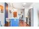 Contemporary kitchen featuring stainless steel appliances, an island with seating, and modern fixtures at 361 17Th Nw St # 1610, Atlanta, GA 30363