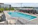 Rooftop pool with lounge chairs and pergolas in an urban setting close to shopping at 361 17Th Nw St # 1610, Atlanta, GA 30363