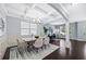 Bright dining space showcasing coffered ceilings, modern decor and natural light at 3845 Alden Place, Cumming, GA 30028