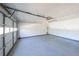 Clean garage featuring an epoxy floor and ample storage space at 403 Flint Hill Ct, Lawrenceville, GA 30044