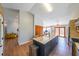 Kitchen with center island, stainless appliances and hardwood floors at 403 Flint Hill Ct, Lawrenceville, GA 30044