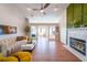 Bright living room featuring a fireplace and hardwood floors at 403 Flint Hill Ct, Lawrenceville, GA 30044