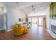 Bright living room featuring a fireplace and hardwood floors at 403 Flint Hill Ct, Lawrenceville, GA 30044