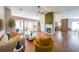 Bright living room featuring a fireplace and hardwood floors at 403 Flint Hill Ct, Lawrenceville, GA 30044