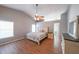 Spacious main bedroom boasts a vaulted ceiling, ceiling fan, and plenty of natural light at 403 Flint Hill Ct, Lawrenceville, GA 30044