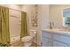 Bathroom featuring a shower and granite sink countertop at 625 Egrets Landing Lndg, Covington, GA 30014