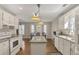 Charming kitchen with granite countertops, a kitchen island, and modern appliances at 3540 Traddsprings Way, Snellville, GA 30039