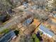 An aerial view of a home with a large backyard and mature trees in a residential neighborhood at 4358 Stockton Way, Marietta, GA 30066