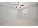 Bedroom with neutral color walls, ceiling fan, carpeted floor, and window at 4358 Stockton Way, Marietta, GA 30066
