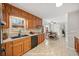 Well-lit kitchen with plenty of wood cabinets, modern appliances, and eat-in breakfast area at 4358 Stockton Way, Marietta, GA 30066