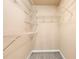 Walk-in closet with wire shelving and neutral carpeting at 2242 Longford Ne Ct, Marietta, GA 30066