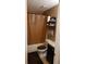 Bathroom featuring dark cabinets, a toilet, and a shower/tub combination at 3129 Rock Pine Way, Snellville, GA 30078