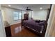 Bedroom with a four poster bed, hardwood floors, recessed lighting and a ceiling fan at 3129 Rock Pine Way, Snellville, GA 30078