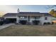 Charming single-story home features a covered porch, light shutters, and a well-maintained front yard at 3129 Rock Pine Way, Snellville, GA 30078