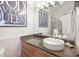 Bathroom featuring a modern vanity with granite countertops, a vessel sink, and a glass-enclosed shower at 2034 Eldorado Ne Dr, Atlanta, GA 30345