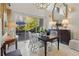 Elegant dining room with a modern table, stylish chairs, and a view of the patio at 2034 Eldorado Ne Dr, Atlanta, GA 30345