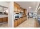 Well-lit kitchen featuring stainless steel appliances, including double ovens and modern countertops at 2034 Eldorado Ne Dr, Atlanta, GA 30345