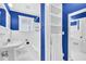 Bathroom with white fixtures, including a tub, toilet, sink and storage cubbies at 2107 Old Dallas Sw Rd, Marietta, GA 30064