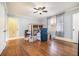 Bedroom with hardwood floors, a ceiling fan, and a sunny window at 2107 Old Dallas Sw Rd, Marietta, GA 30064