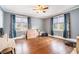 Bright, spacious bedroom with hardwood floors and large windows providing ample natural light at 2107 Old Dallas Sw Rd, Marietta, GA 30064