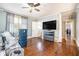 Bedroom with hardwood floors, a ceiling fan, and natural light at 2107 Old Dallas Sw Rd, Marietta, GA 30064