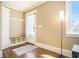 A welcoming entryway with built-in storage, hardwood floors and a coat rack at 2107 Old Dallas Sw Rd, Marietta, GA 30064