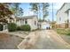 Side view of a house with a detached garage and a long driveway at 2107 Old Dallas Sw Rd, Marietta, GA 30064