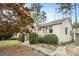 Exterior shot of a home with a well-manicured front yard and a paved walkway at 2107 Old Dallas Sw Rd, Marietta, GA 30064