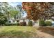 Charming single-story home with a well-maintained lawn and mature trees at 2107 Old Dallas Sw Rd, Marietta, GA 30064