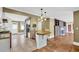 Open kitchen featuring stainless steel appliances, light fixtures, and hardwood floors in the connected living area at 2107 Old Dallas Sw Rd, Marietta, GA 30064