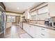 Bright kitchen with white cabinetry, stainless steel appliances, and tiled floors at 2107 Old Dallas Sw Rd, Marietta, GA 30064