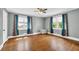 Living room featuring hardwood floors, natural light, ceiling fan and neutral paint at 2107 Old Dallas Sw Rd, Marietta, GA 30064