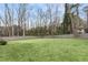 Expansive backyard enclosed by a gray wooden fence, offering privacy and ample space at 3245 Westmart Ln, Atlanta, GA 30340
