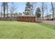 Well-maintained backyard with a gray fence surrounding the property at 3245 Westmart Ln, Atlanta, GA 30340