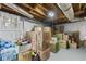 Unfinished basement with natural light and exposed ductwork for potential storage or recreation at 3245 Westmart Ln, Atlanta, GA 30340