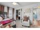 Comfortable bedroom featuring a walk-in closet and an adjacent bathroom at 3245 Westmart Ln, Atlanta, GA 30340