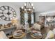 Bright dining room featuring hardwood floors, stylish seating, and modern lighting at 3245 Westmart Ln, Atlanta, GA 30340