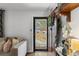 Inviting entryway featuring a decorative door, hardwood floors, and light-filled ambiance at 3245 Westmart Ln, Atlanta, GA 30340