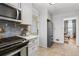 Stylish kitchen with stainless steel appliances, white countertops, and a view into the dining area at 3245 Westmart Ln, Atlanta, GA 30340