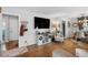 Bright living room with hardwood floors, comfortable seating and contemporary decor at 3245 Westmart Ln, Atlanta, GA 30340
