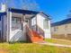 Charming home with painted brick accents, modern railings, and a covered porch at 1074 Hobson Sw St, Atlanta, GA 30310