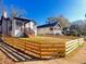 This attractive home with a new fence boasts a well-maintained lawn at 1074 Hobson Sw St, Atlanta, GA 30310