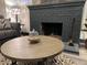 Cozy living room showcases a fireplace and modern coffee table at 1074 Hobson Sw St, Atlanta, GA 30310