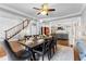 Open-concept dining room with hardwood floors and seamless access to living areas and staircase at 238 Chappell Rd, Fayetteville, GA 30215