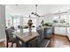 Bright kitchen with an island, granite countertops, stainless steel appliances, and hardwood floors at 238 Chappell Rd, Fayetteville, GA 30215