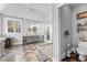 Bright bathroom featuring double vanity, walk-in glass shower, and herringbone pattern floor at 238 Chappell Rd, Fayetteville, GA 30215