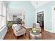 Bright sun room featuring a vaulted ceiling, hardwood floors, and oversized windows at 238 Chappell Rd, Fayetteville, GA 30215