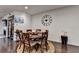 Dining room with seating for six, a modern light fixture, and stylish decor at 3030 Appling Hills Dr, Dacula, GA 30019