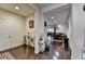 Welcoming foyer with hardwood floors and a view into the dining and living areas at 3030 Appling Hills Dr, Dacula, GA 30019